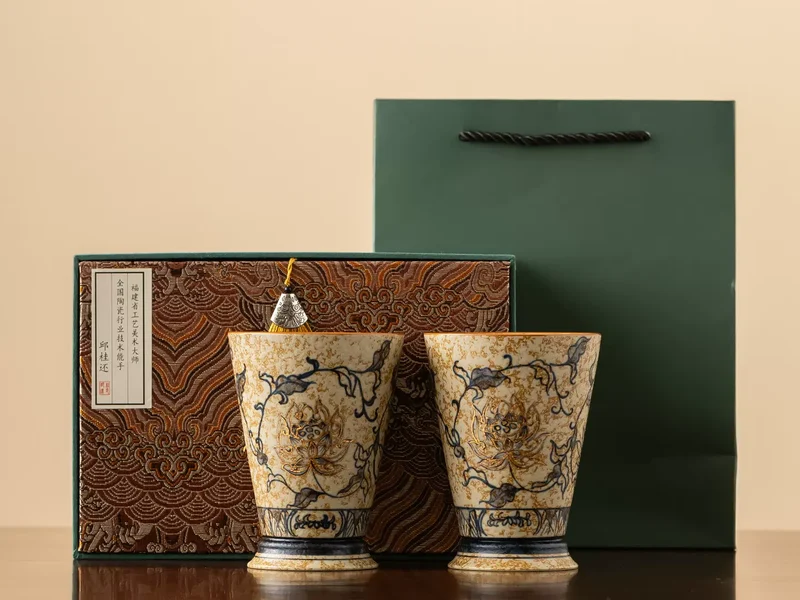 The Lotus Duet hand-painted porcelain pair with its presentation box