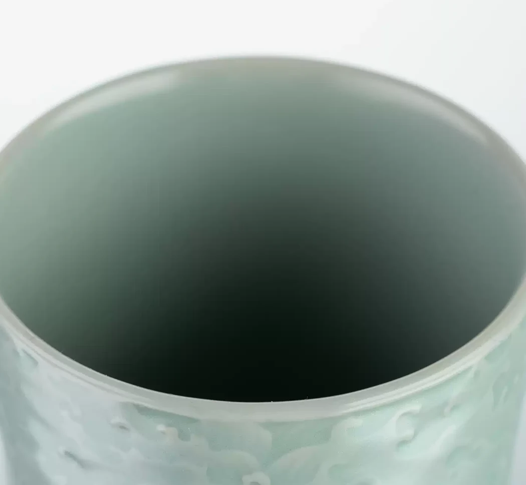 A close look at the smooth interior and rounded lip of the Wave Cup
